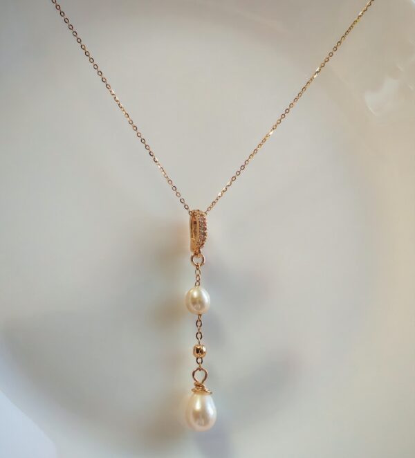 IMG_20260130_170929_edit_1190428856547811 Collier pendentif perle violet champagne plaqué or 14 carats