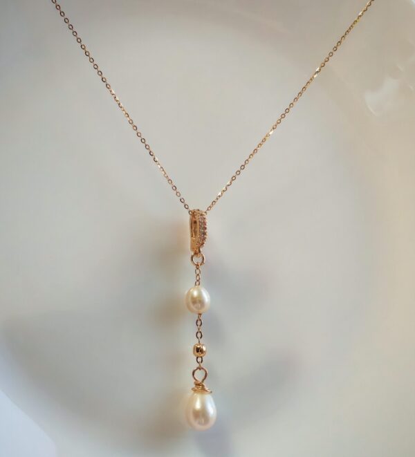 IMG_20260130_170929_edit_1190428856547811 Collier pendentif perle violet champagne plaqué or 14 carats